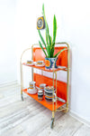 Iconic orange golden 1970s FOLDABLE BAR CART 'Dinett' by Bremshey